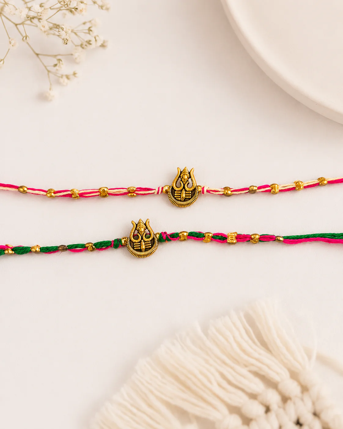 Pack of 2 Green-Pink Trishoola Rakhi Set | Tilak Set Included - Image 3